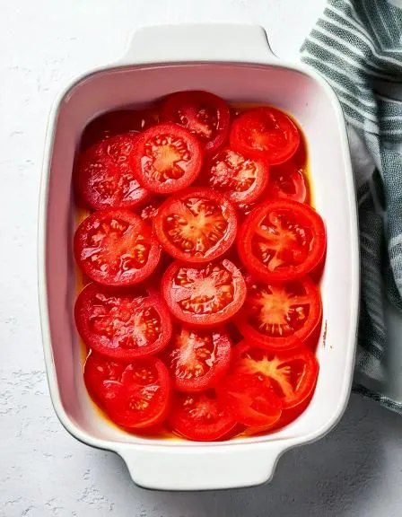 Put fresh sliced tomatoes in casserole. 2 ingredients later: A quick Italian bake