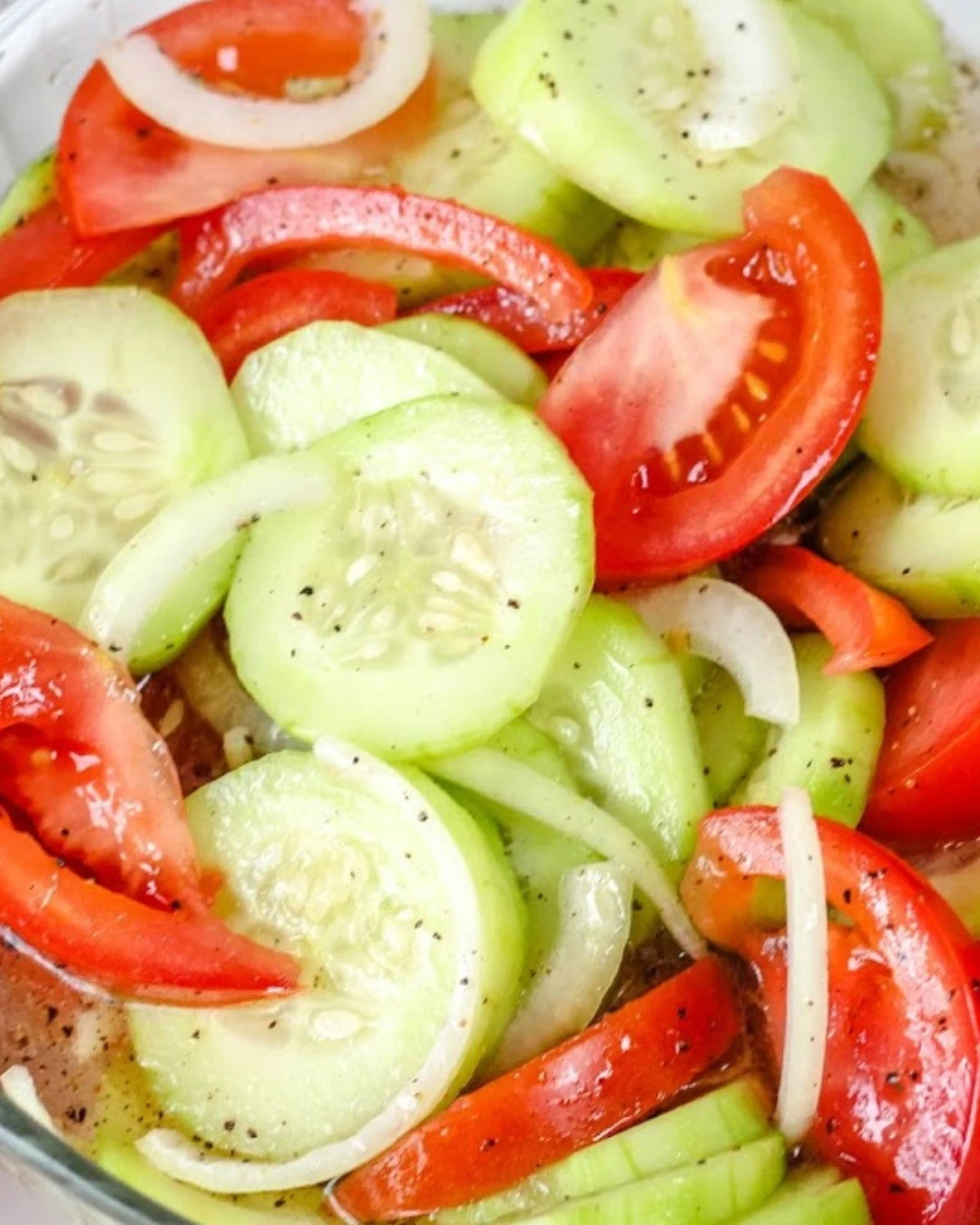 marinated cucumbers, onions and tomatoes